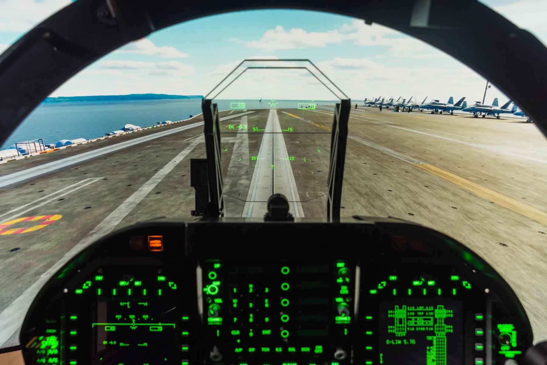 Cockpit view aligned with an aircraft carrier runway