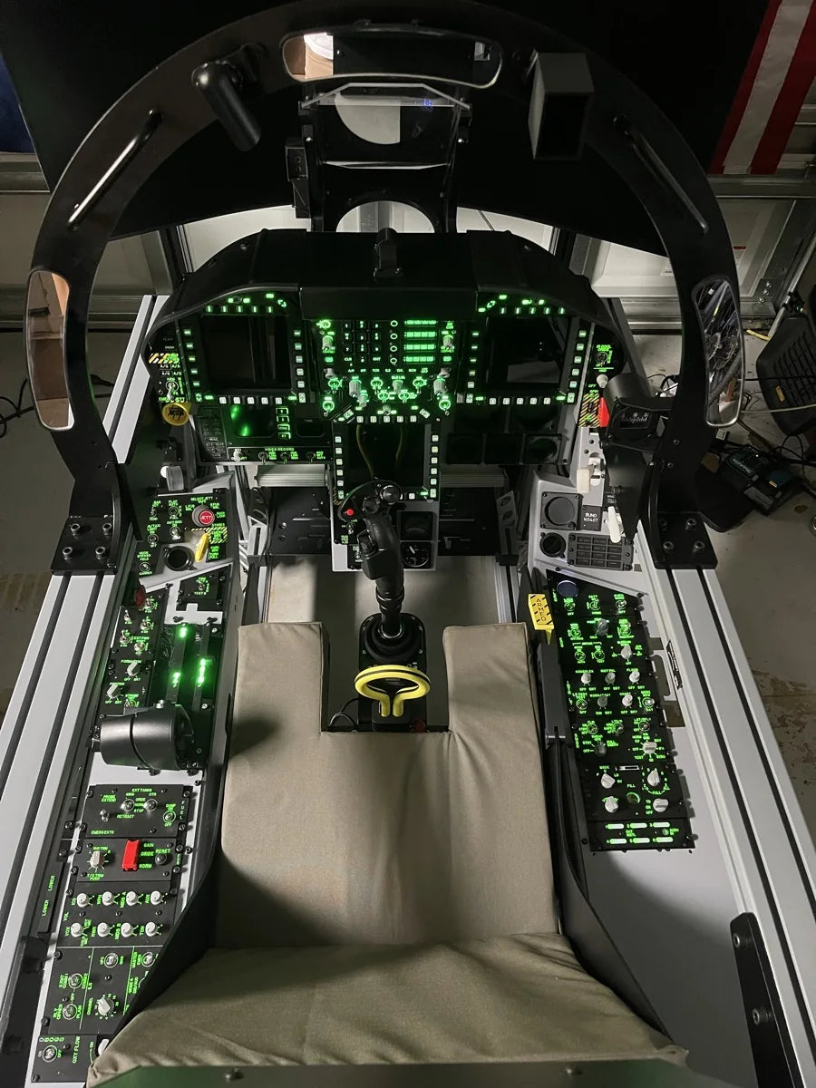 Empty cockpit showing the seat, consoles, and main instrument panel