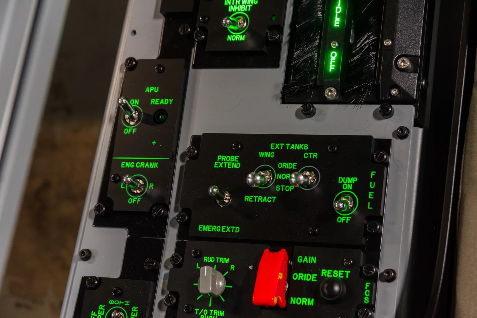 Close detail of illuminated physical cockpit switches