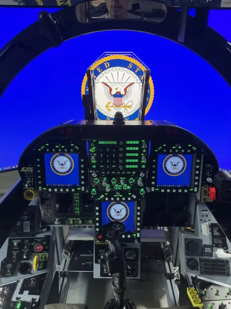 Illuminated cockpit beneath a blue display