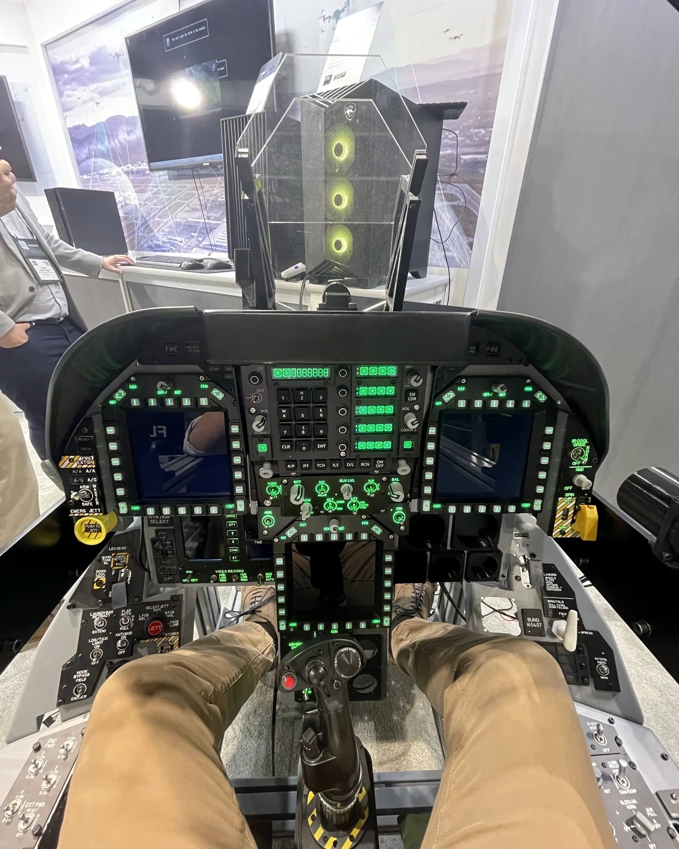 Pilot view of the illuminated Dogfight Dynamics instrument panel at I/ITSEC 2025