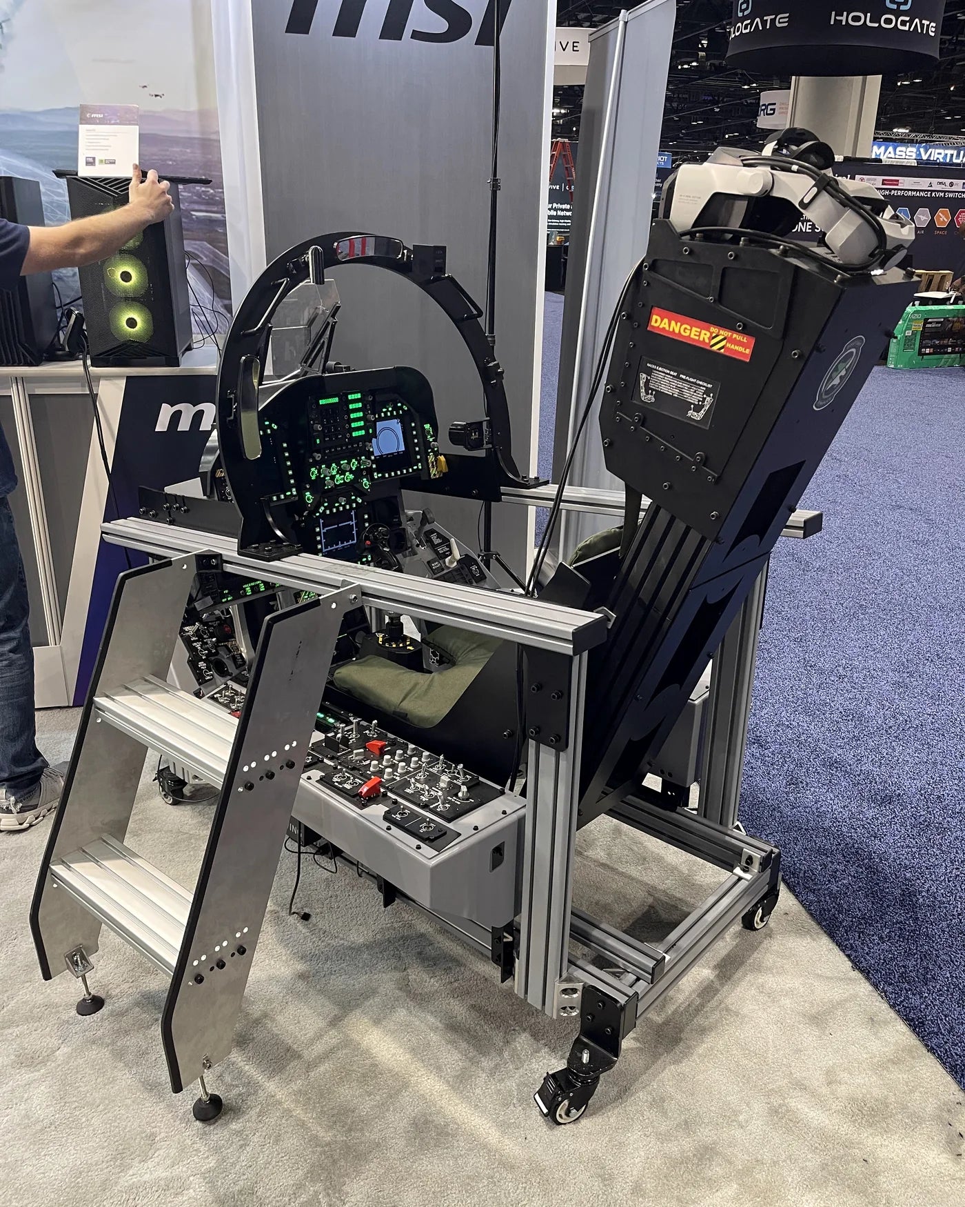 Dogfight Dynamics cockpit installed at the MSI booth for I/ITSEC 2025
